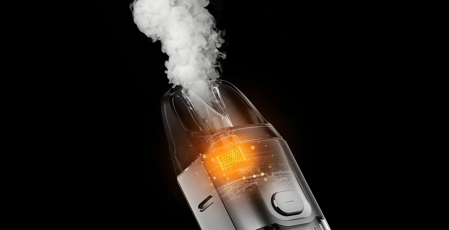 Detail integrovaného mesh žhavení Vaporesso LUXE X cartridge při tvorbě páry v POD e-cigaretě